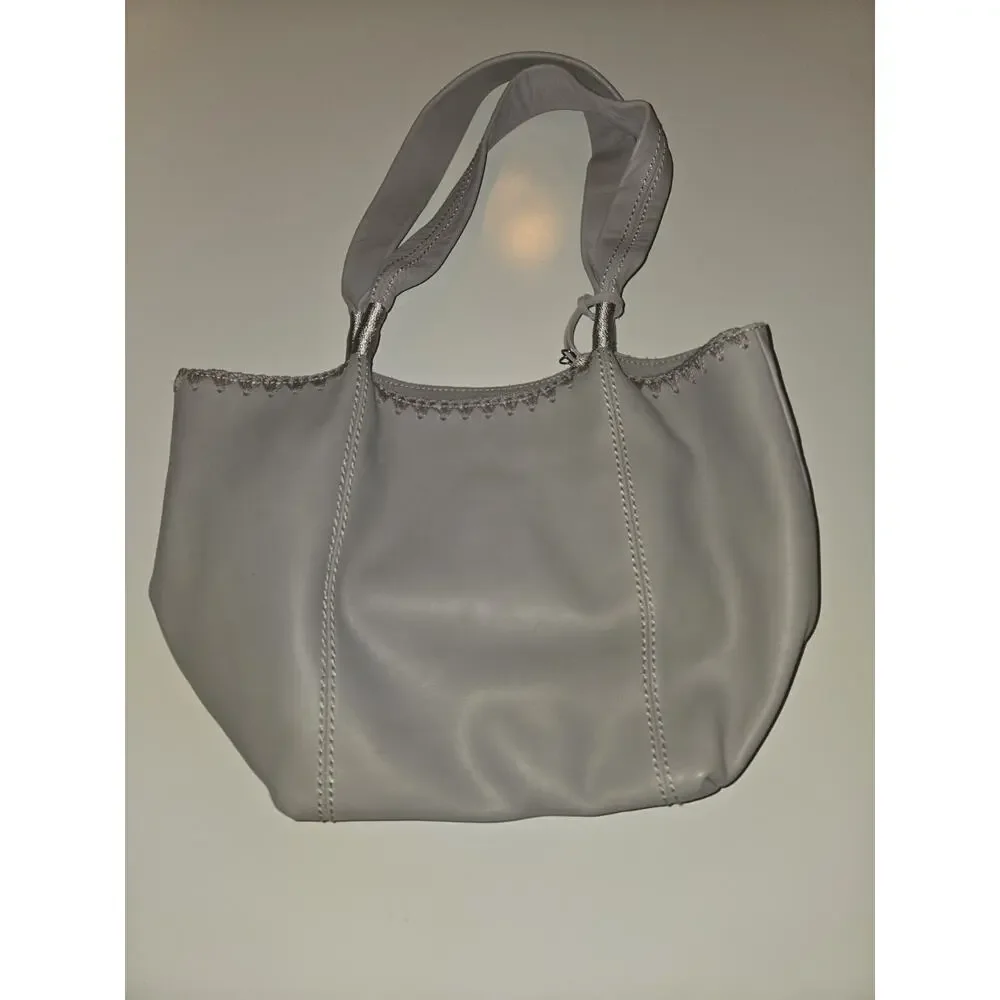 The Sak Gray Leather Tote Shoulder Bag Handbag Tassel Pockets Magnetic Closure